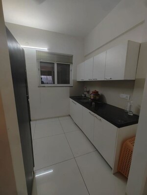 Kitchen in 5 BHK Apartment at Kolte Patil 24K Opula, Pimple Nilakh – for Sale