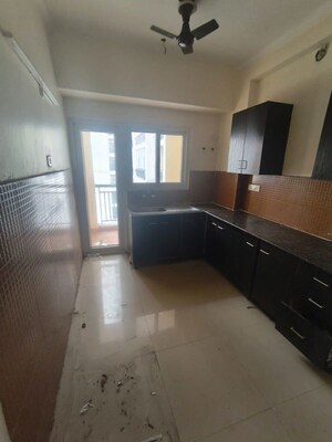 Kitchen in 3.5 BHK Apartment at Aims Golf City, Sector 75 – for Rent