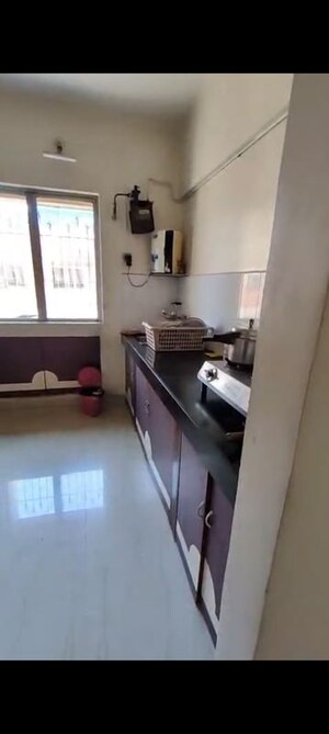 Kitchen in 1 BHK Apartment at Happy Valley, Manpada – for Rent