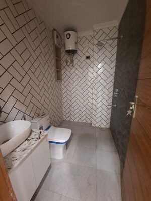 Bathroom in 3 BHK Builder Floor at Chattarpur – for Rent