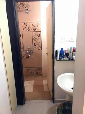 Bathroom in 1.5 BHK Apartment at Lakshadeep Palace, Pimple Saudagar – for Sale