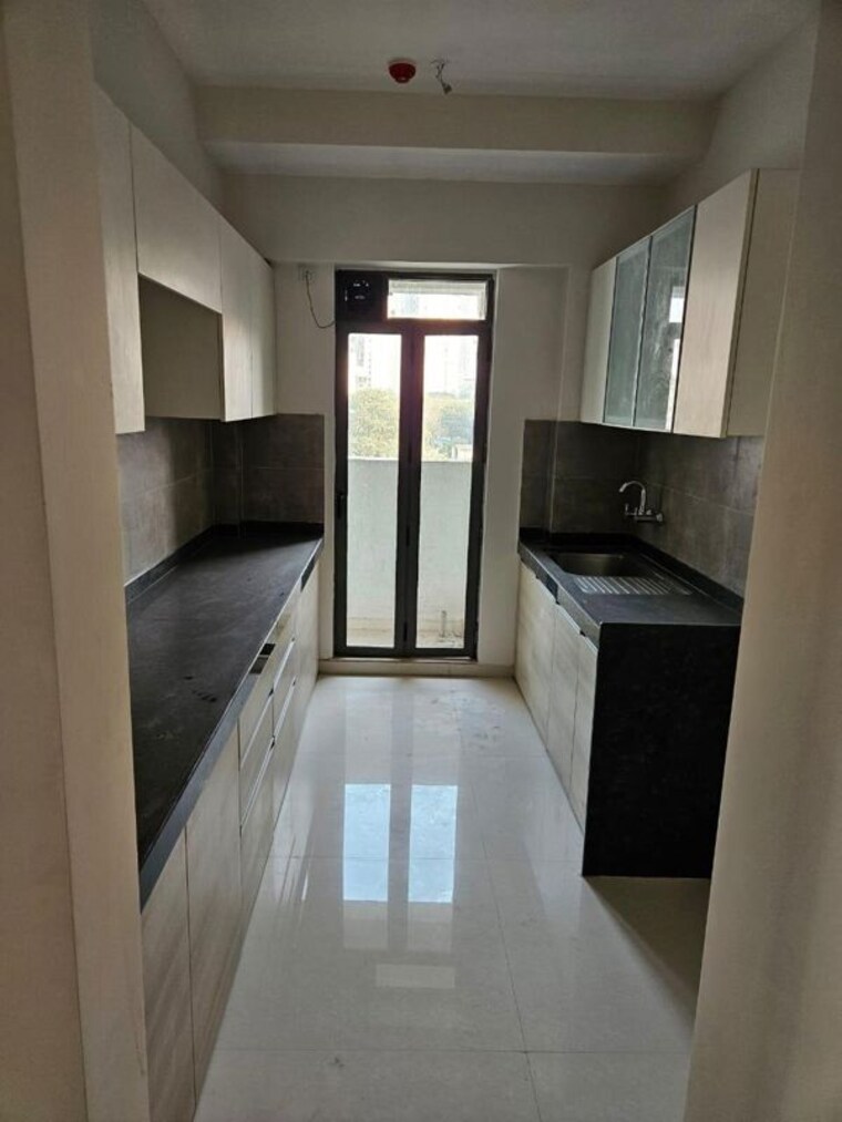 Kitchen, rustomjee-summit 3 Bedroom 1007 Sq.Ft. Apartment In Borivali East Mumbai 10533471
