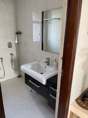 Bathroom in 3.5 BHK Apartment at Unitech The Close South, Sector 50 – for Rent