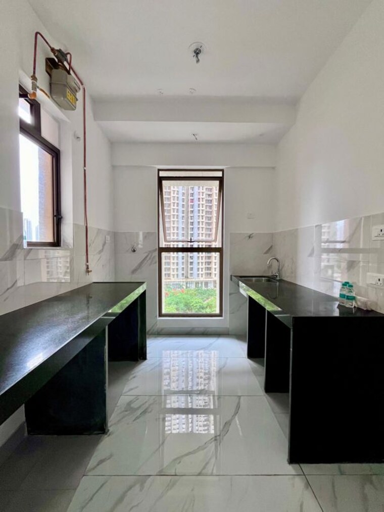 Kitchen, raymond-ten-x-habitat 1 Bedroom 550 Sq.Ft. Apartment In Pokhran Road No Two Thane 10594648