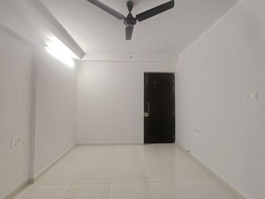 Building Lobby in 1.5 BHK Apartment at Godrej Emerald, Ghodbunder Road – for Rent