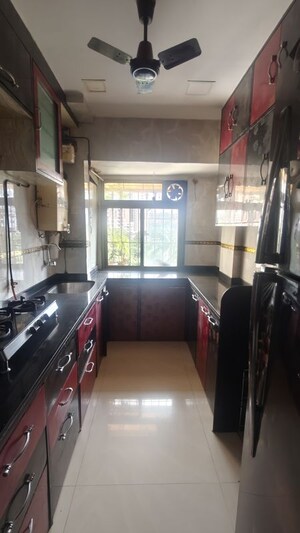 Kitchen in 1 BHK Apartment at Happy Valley, Manpada – for Rent