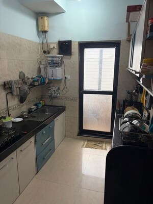 Kitchen in 3 BHK Apartment at Raheja Interface Heights, Malad West – for Rent