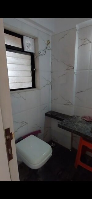 Bathroom in 1 BHK Apartment at Harshail Falcon, Malad West – for Rent
