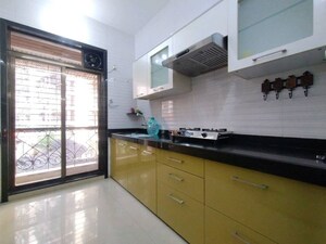 Kitchen in 2 BHK Apartment at Kesar Symphony, Kharghar – for Rent