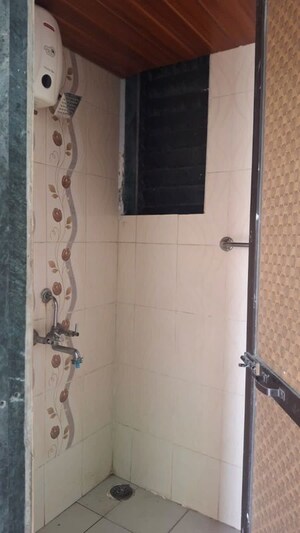 Bathroom in 1 BHK Apartment at K K Nehru Tower, Ulwe – for Sale