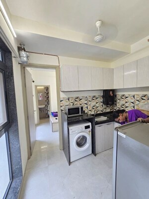 Kitchen in 1.5 BHK Apartment at Ajmera Greenfinity, Wadala East – for Rent