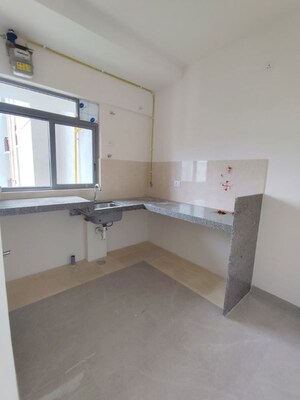 Kitchen in 1 BHK Apartment at Piramal Vaikunth, Balkum Pada – for Rent