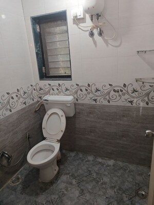 Bathroom in 2 BHK Apartment at Kendriya Vihar Seawoods, Seawoods West – for Rent