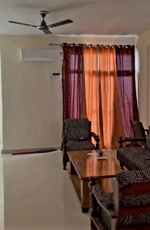 Living Room in 3 BHK Apartment at Ansal Golf Villas, Sushant Golf City – for Rent