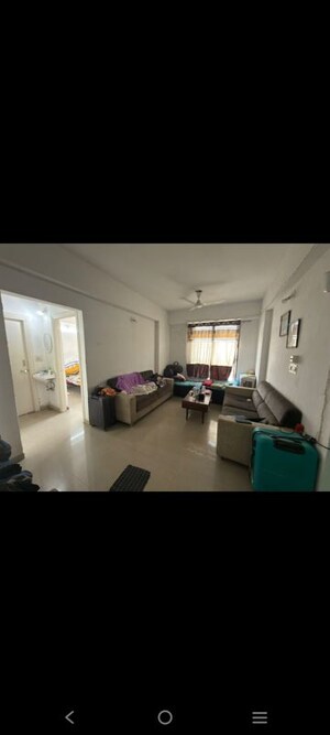 Living Room in 1 BHK Apartment at Applewood Satyesh Residency, Shela – for Rent