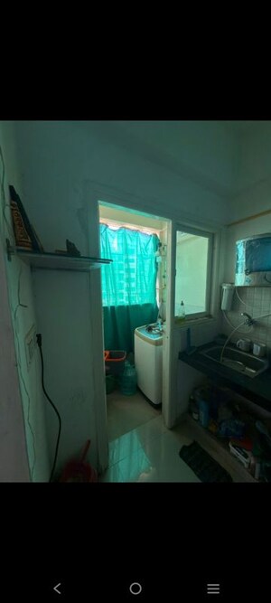 Living Room in 1 BHK Apartment at Applewood Satyesh Residency, Shela – for Rent