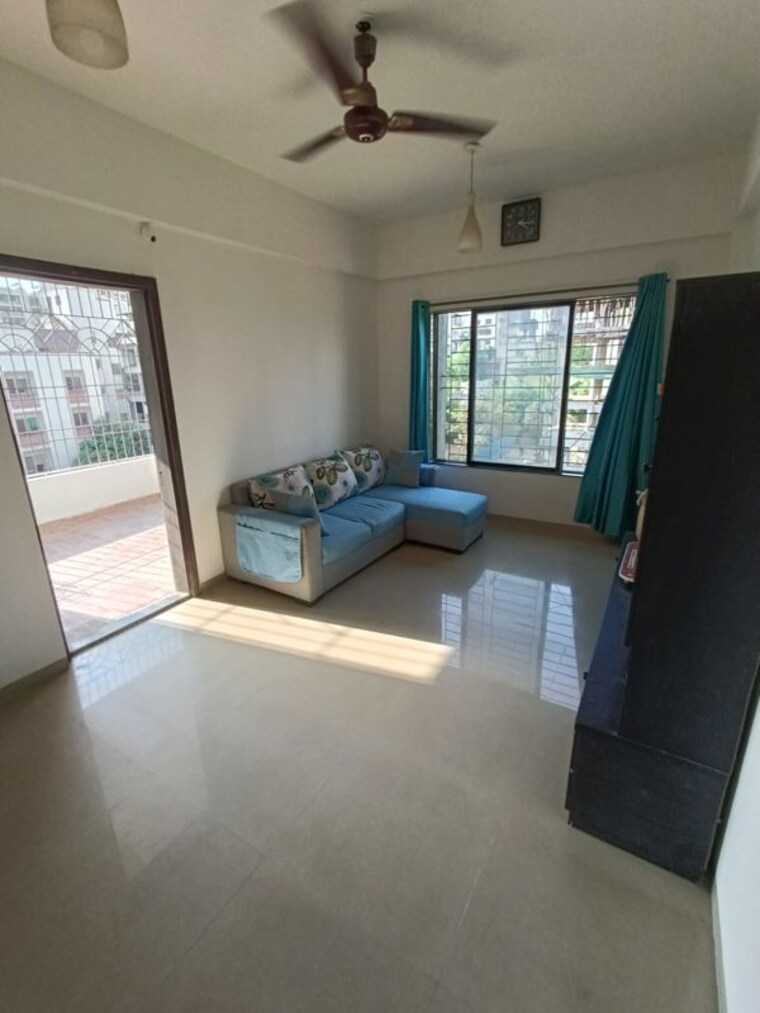 Living Room, kundan-arvaan 1 Bedroom 596 Sq.Ft. Apartment In Balewadi Pune 10594896