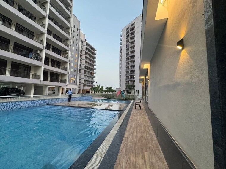Swimming Pool, pareena-the-elite-residences 3 Bedroom 1970 Sq.Ft. Apartment In Sector 99 Gurgaon 10594903