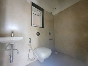 Bathroom in 2 BHK Apartment at Puranik City Reserva, Ghodbunder Road – for Rent
