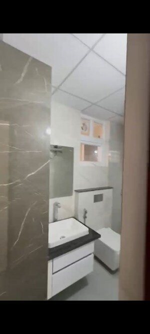 Bathroom in 3 BHK Apartment at Maya Green Lotus Utsav, International Airport Road – for Rent