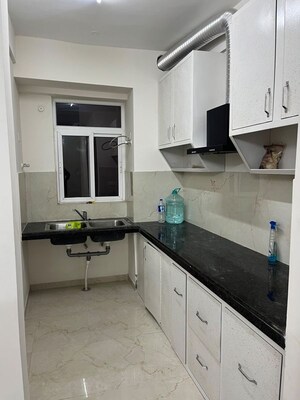 Kitchen in 3.5 BHK Builder Floor at Smart World Gems, Sector 89 – for Rent
