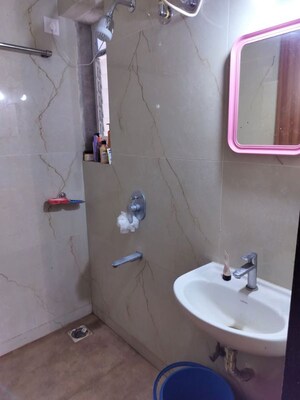 Bathroom in 2 BHK Apartment at KM Horizon Flora, Ghodbunder Road – for Sale