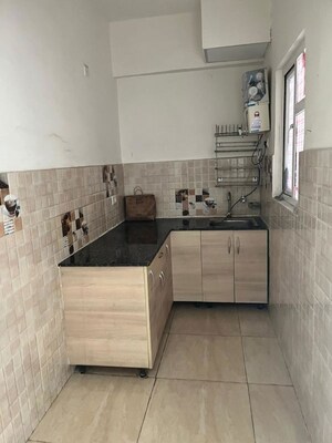 Kitchen in 2 BHK Apartment at Gaur City 2 - 14th Avenue, Sector 16c Greater Noida – for Rent