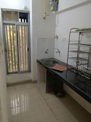 Kitchen in 1 BHK Apartment at Harjas CHS, Ic Colony – for Rent