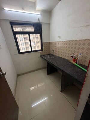 Kitchen in 1 BHK Apartment at Dosti West County, Balkum Pada – for Rent