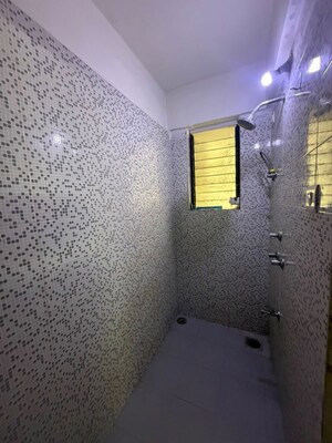 Bathroom in 1 BHK Apartment at Dosti West County, Balkum Pada – for Rent
