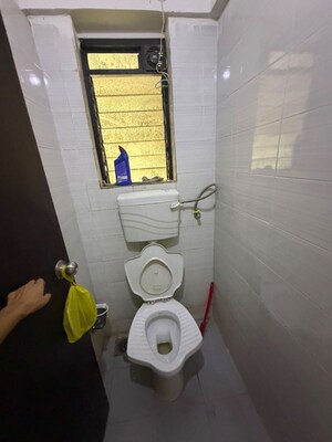 Bathroom in 1 BHK Apartment at Dosti West County, Balkum Pada – for Rent
