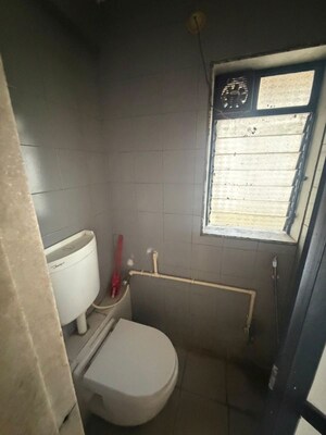 Bathroom in 1 BHK Apartment at Highland Residency CHSL, Balkum Pada – for Rent