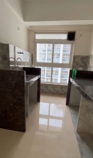 Kitchen in 1 BHK Apartment at Group Satellite Elegance, Goregaon East – for Sale