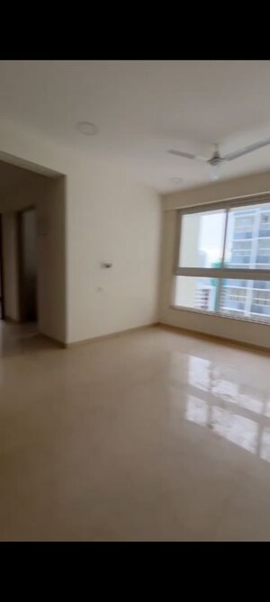 Room in 1 BHK Apartment at Group Satellite Elegance, Goregaon East – for Sale