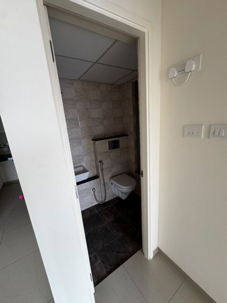 Bathroom, mahindra-happinest-tathawade-phase-1 1 Bedroom 600 Sq.Ft. Apartment In Tathawade Pune 10595216