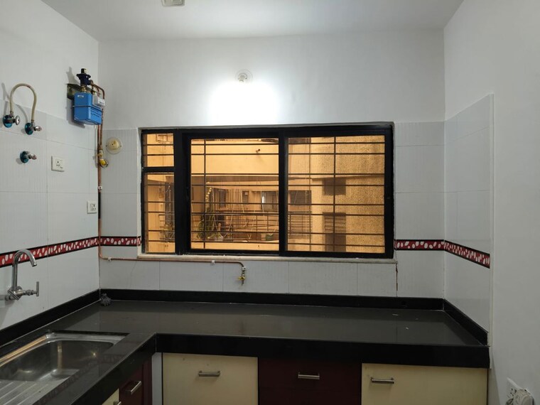 Kitchen, magarpatta-trillium 3 Bedroom 1500 Sq.Ft. Apartment In Hadapsar Pune 10595310