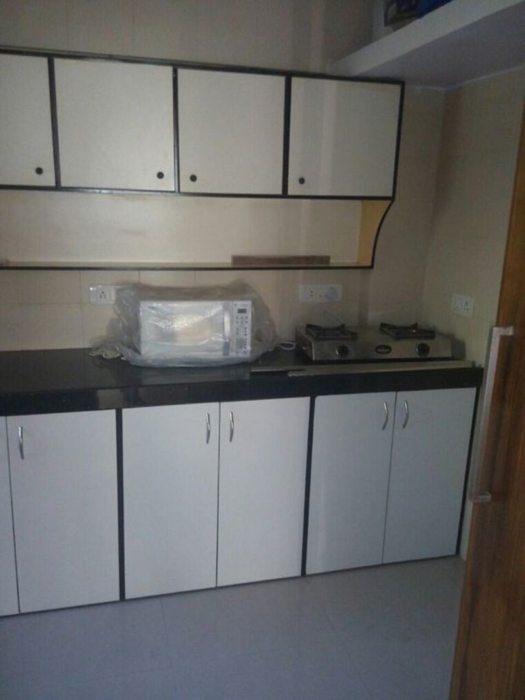 Kitchen, sagar-sangeet-apartment 2 Bedroom 800 Sq.Ft. Apartment In Juhu Mumbai 10595083
