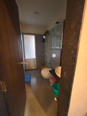 Bathroom in 2 BHK Apartment at Siddhi Highland Haven, Balkum Pada – for Rent