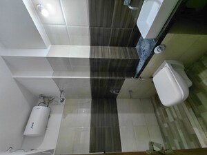 Bathroom in 1 BHK Apartment at Harshail Falcon, Malad West – for Rent