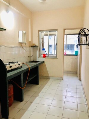 Kitchen in 3 BHK Apartment at Magarpatta City Roystonea, Hadapsar – for Rent