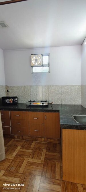 Kitchen in Studio Apartment at Defence Colony – for Rent