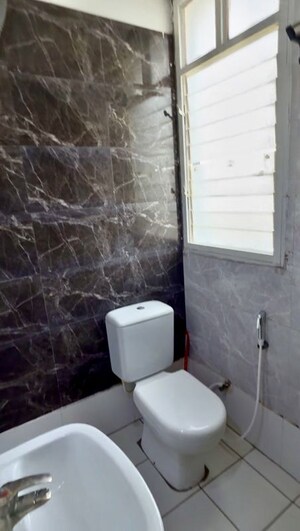 Bathroom in 3 BHK Apartment at Indraprastha Industrial Area – for Sale