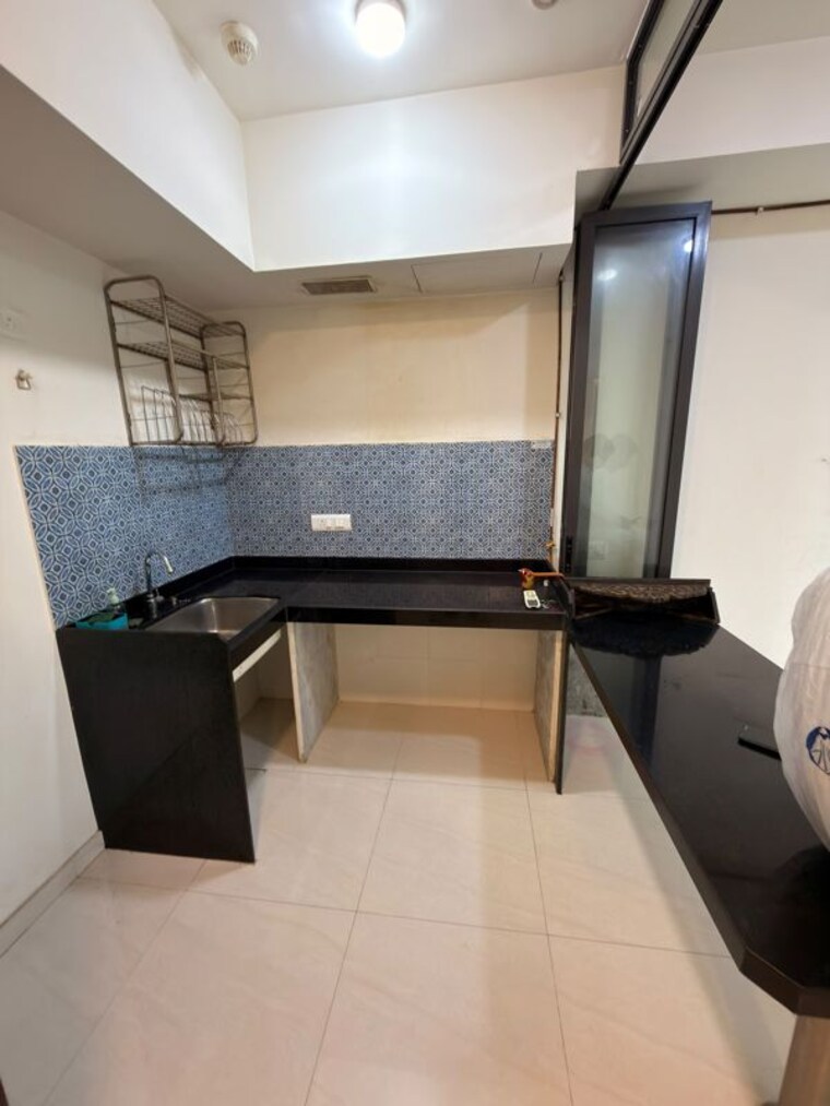 Kitchen, lodha-majiwada-tower-4 1 Bedroom 450 Sq.Ft. Apartment In Kolshet Thane 10594133