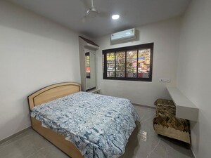 Bedroom in 2 BHK Apartment at Takshila CHS, Andheri East – for Rent