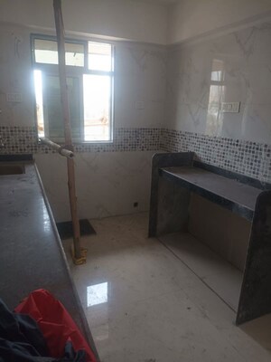 Kitchen in 2 BHK Apartment at DGS Sheetal Tapovan, Malad East – for Rent