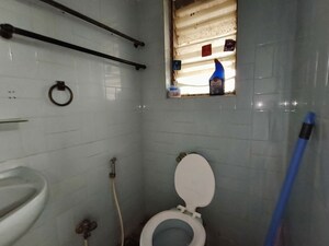 Bathroom in 2 BHK Apartment at Brindaban CHS, Poonam Nagar – for Sale
