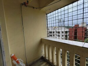 Kitchen in 2 BHK Apartment at Brindaban CHS, Poonam Nagar – for Sale