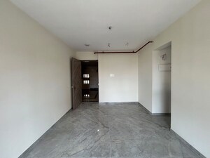 Living Room in 1 BHK Apartment at Ajmera Boulevard, Malad West – for Sale