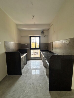 Kitchen in 1 BHK Apartment at Ajmera Boulevard, Malad West – for Sale