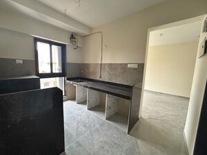 Kitchen in 1 BHK Apartment at Ajmera Boulevard, Malad West – for Sale